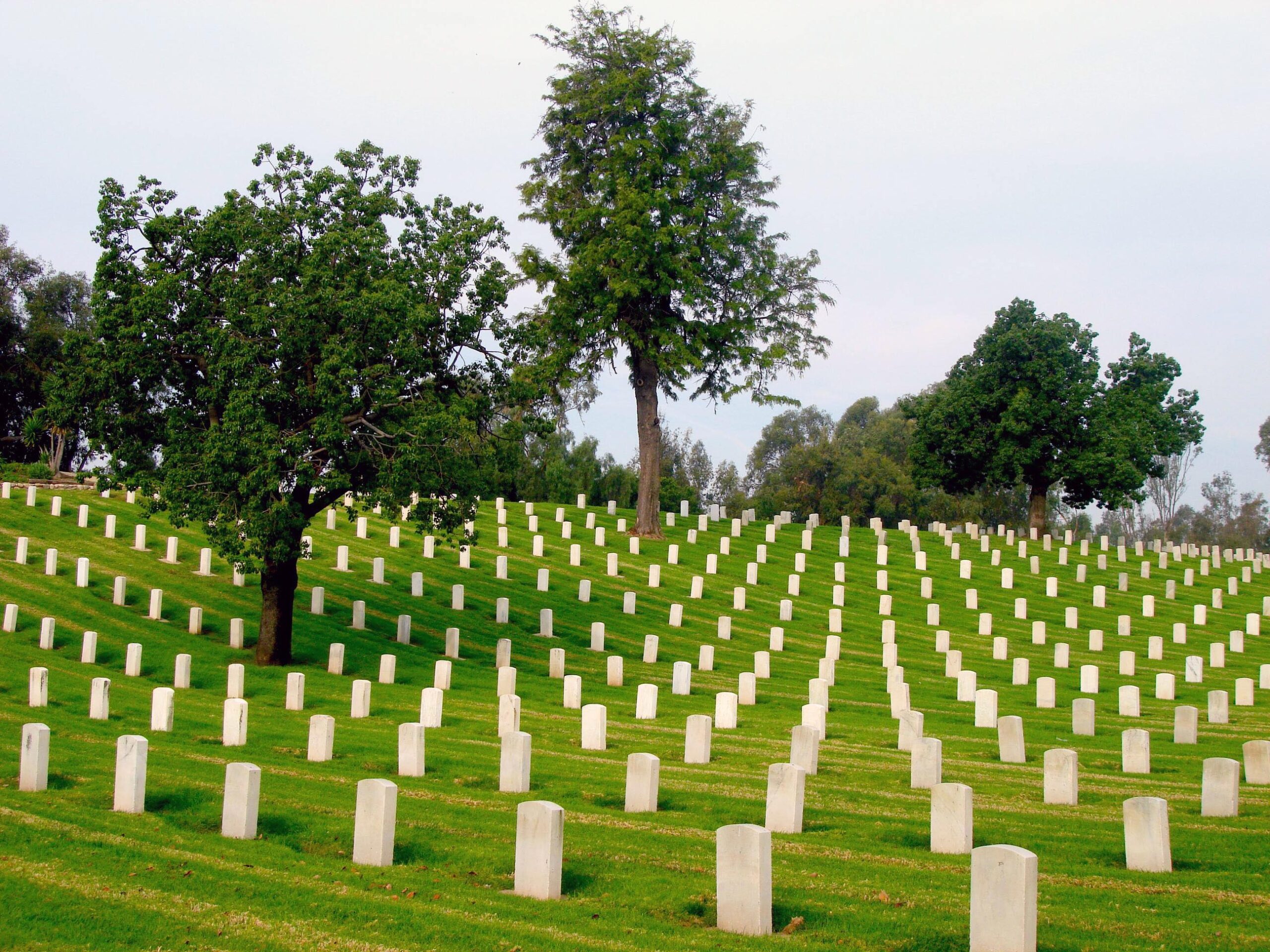 Veteran cemetery traditions at Gravesite in Saratoga County, NY with respectful flags and memorial decorations