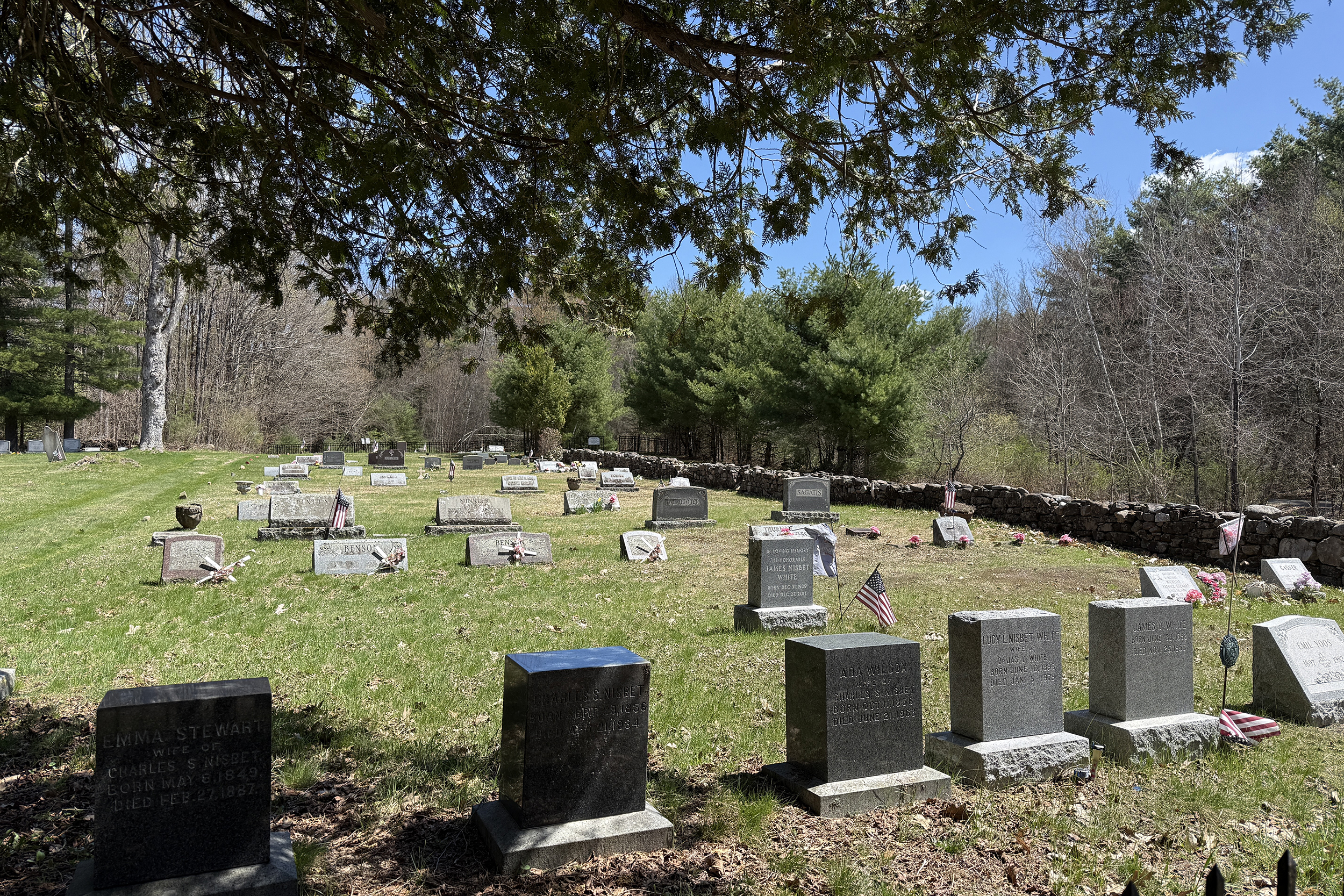 Overview of Foster Hill Cemetery in Galway, New York with historic headstones and cemetery grounds.