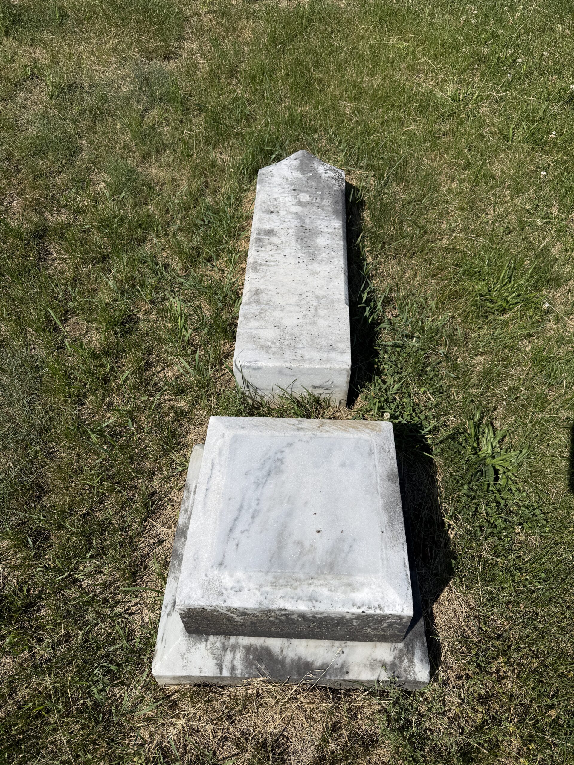 Fallen headstone at Gurn Spring Cemetery in Wilton New York needing documentation and preservation-focused repair evaluation
