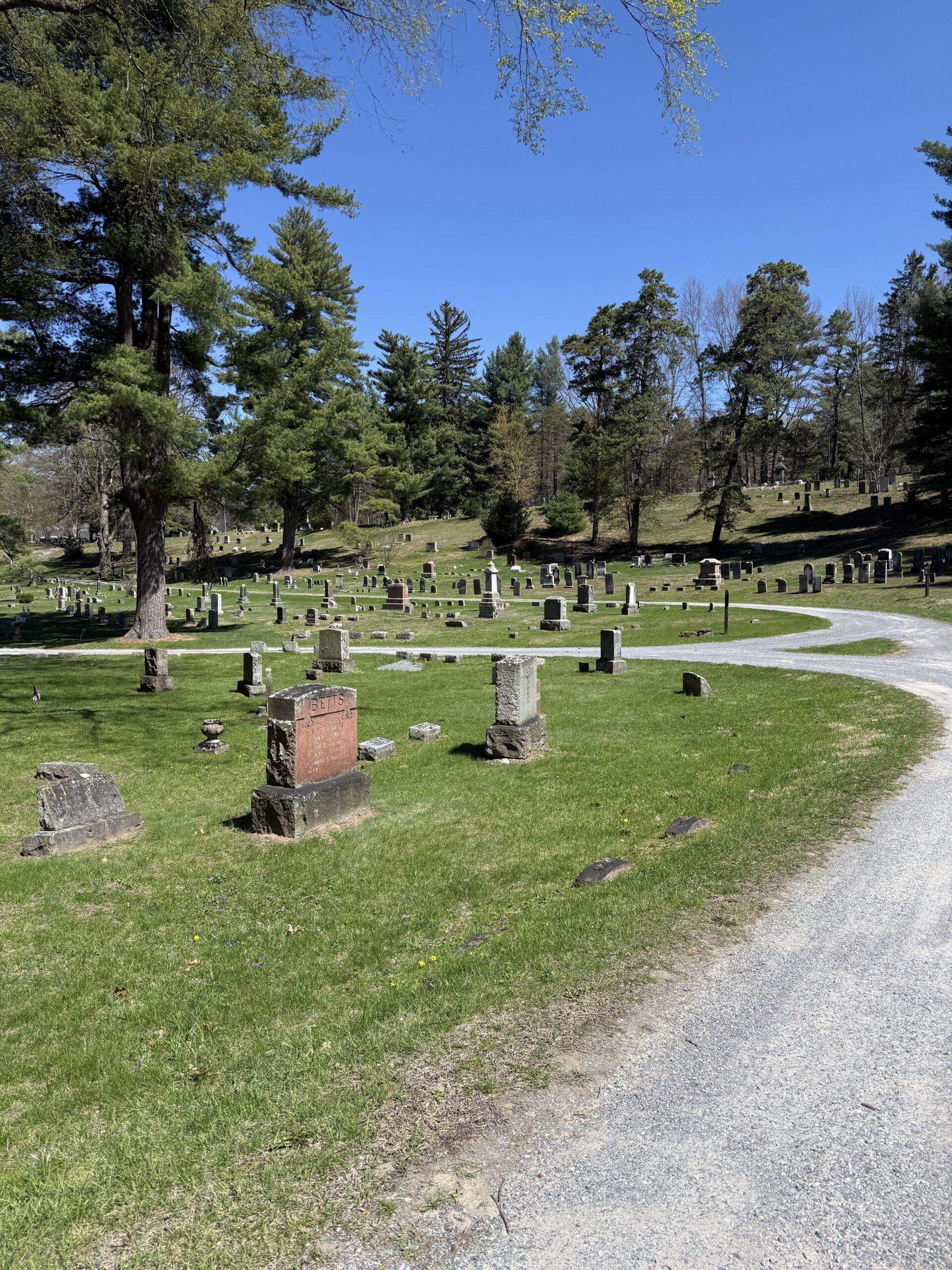 Winding cemetery road and historic landscape at Jonesville Cemetery in Clifton Park New York