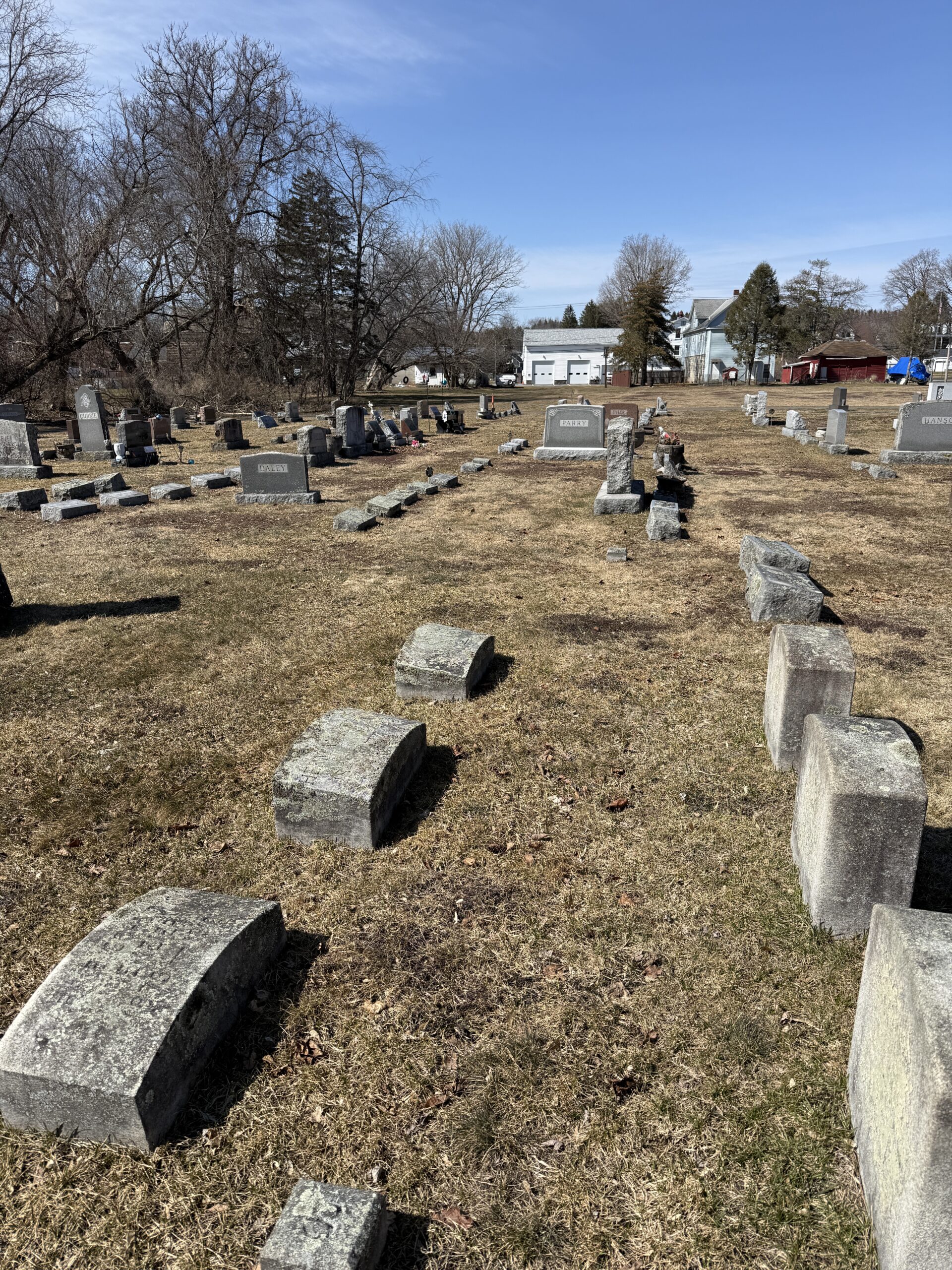 Landscape view of Pine Grove Cemetery in Tribes Hill New York with memorials and open cemetery grounds
