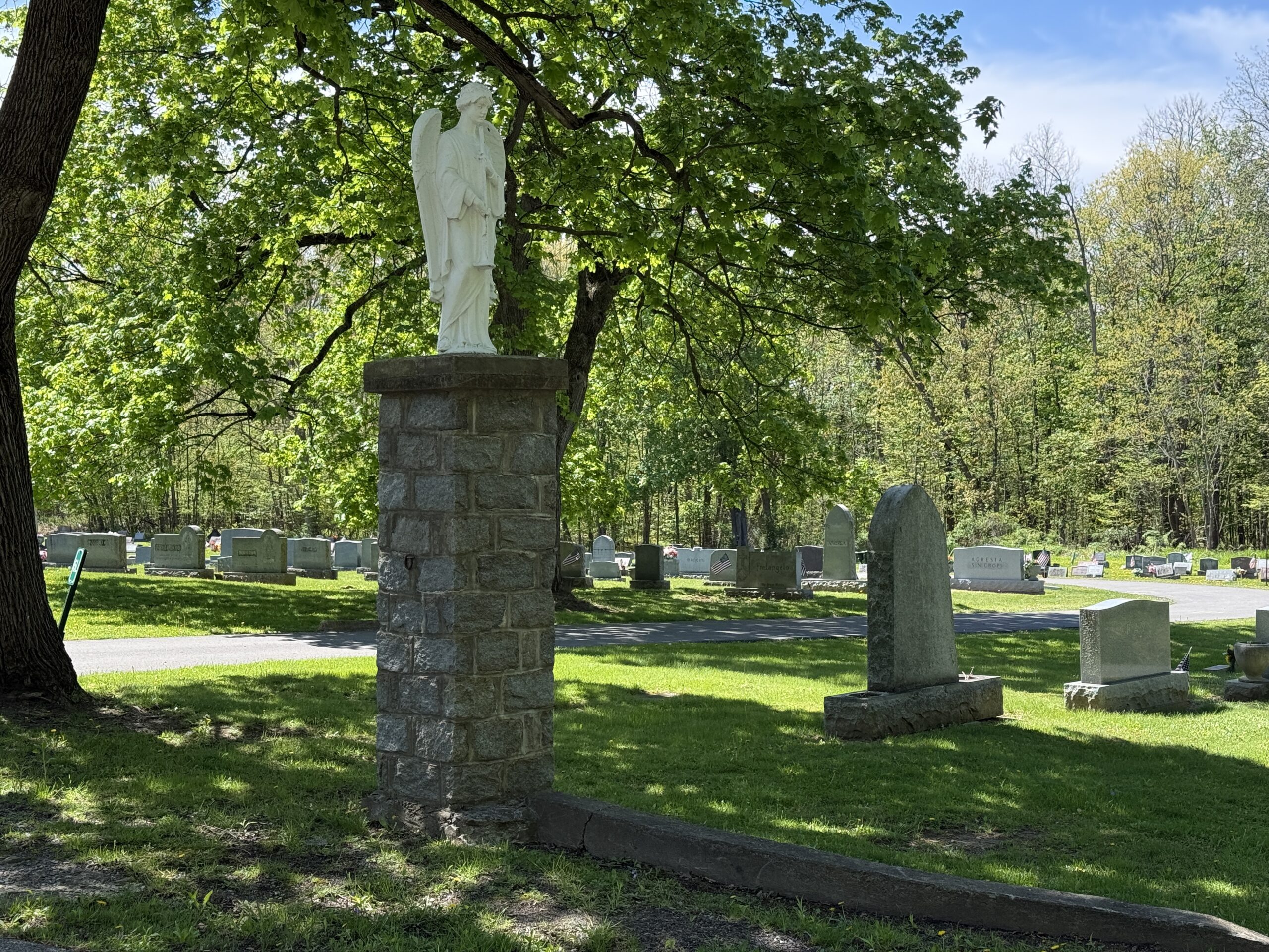Angel statue memorial at St. Michael Cemetery in Amsterdam New York
