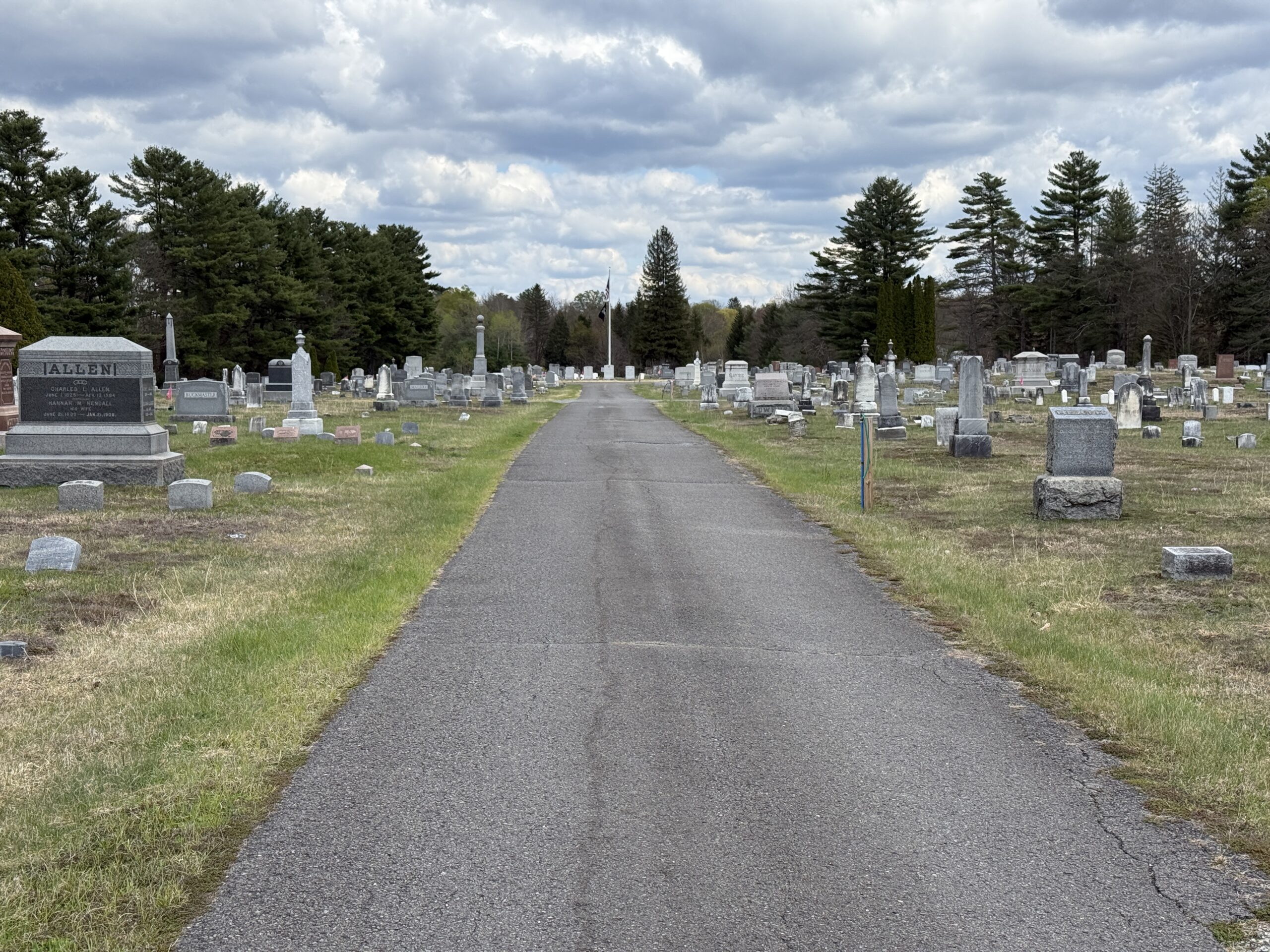 Roadway entrance and cemetery landscape at Corinth Rural Cemetery in Corinth New York