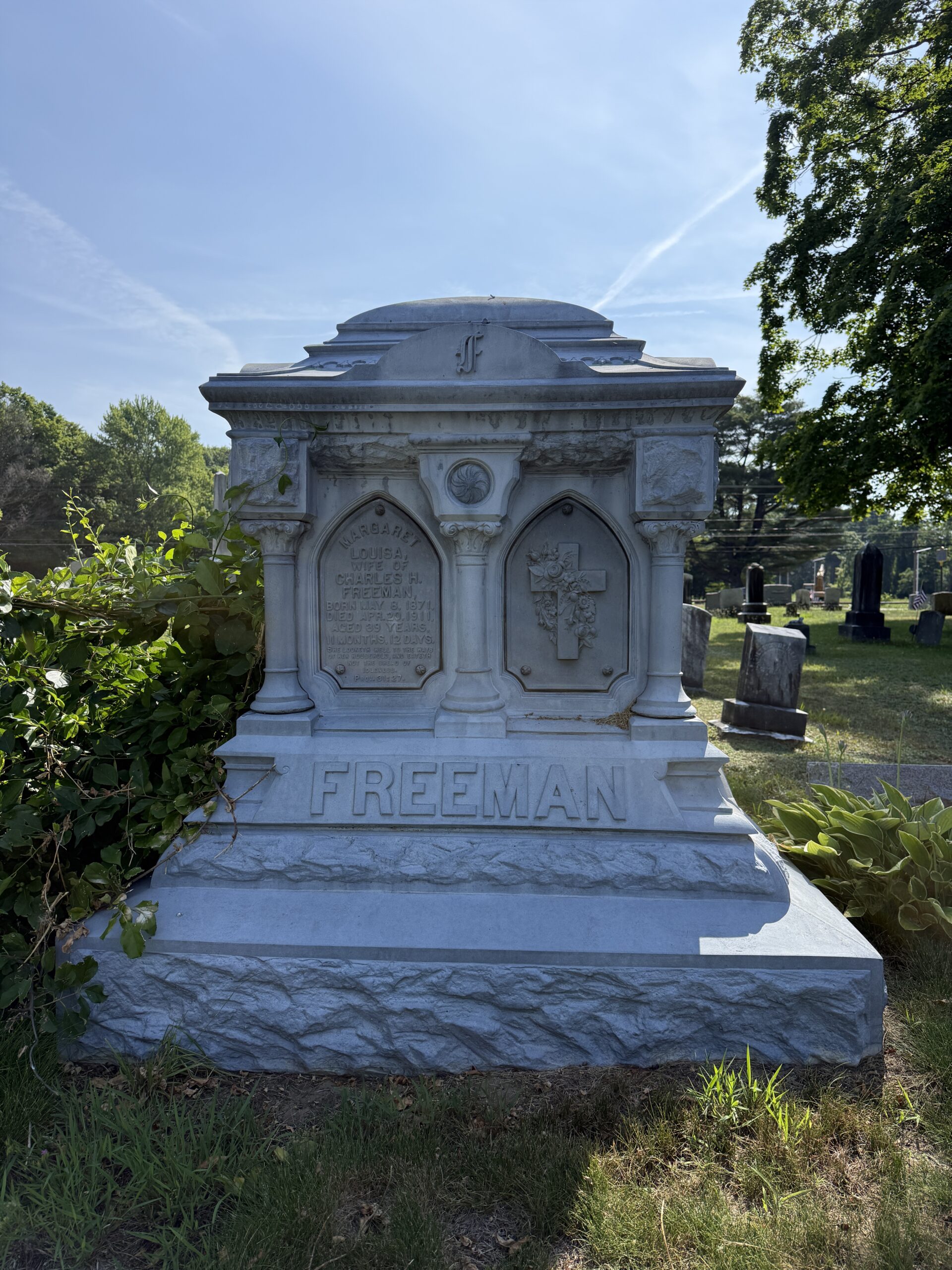 Freeman family white bronze zinc monument at Malta Ridge Cemetery in Malta New York