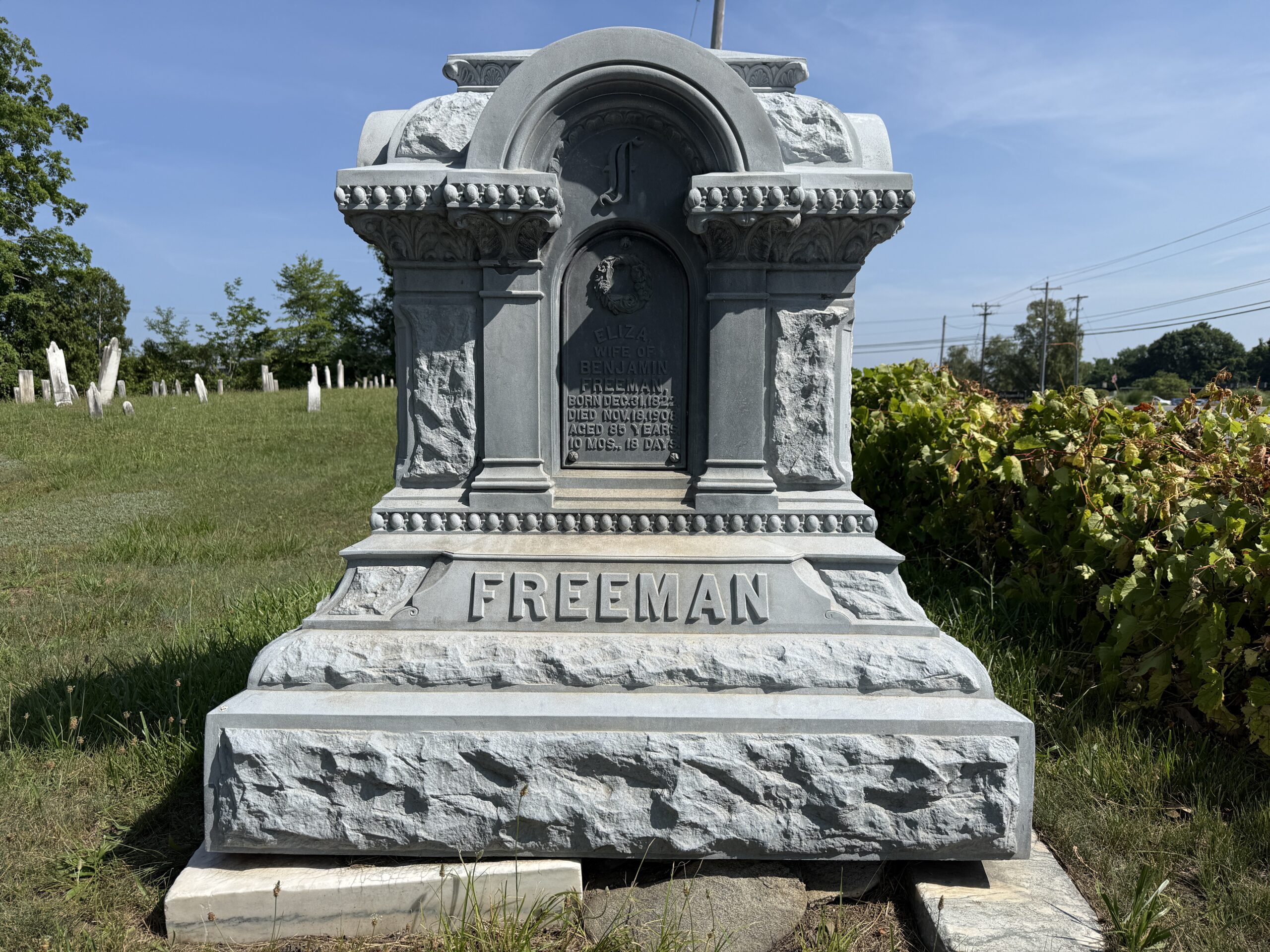 Second view of Freeman family white bronze monument at Malta Ridge Cemetery in Malta New York
