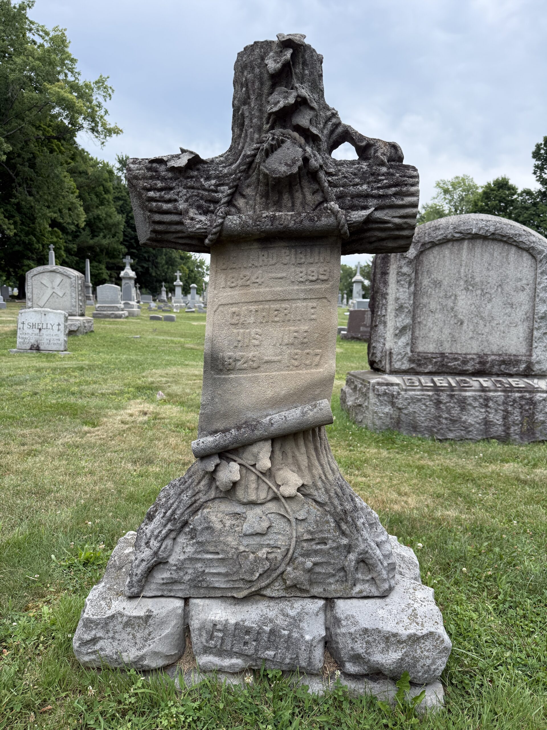 Historic carved tree-stump memorial at St. Mary’s Cemetery in Waterford New York