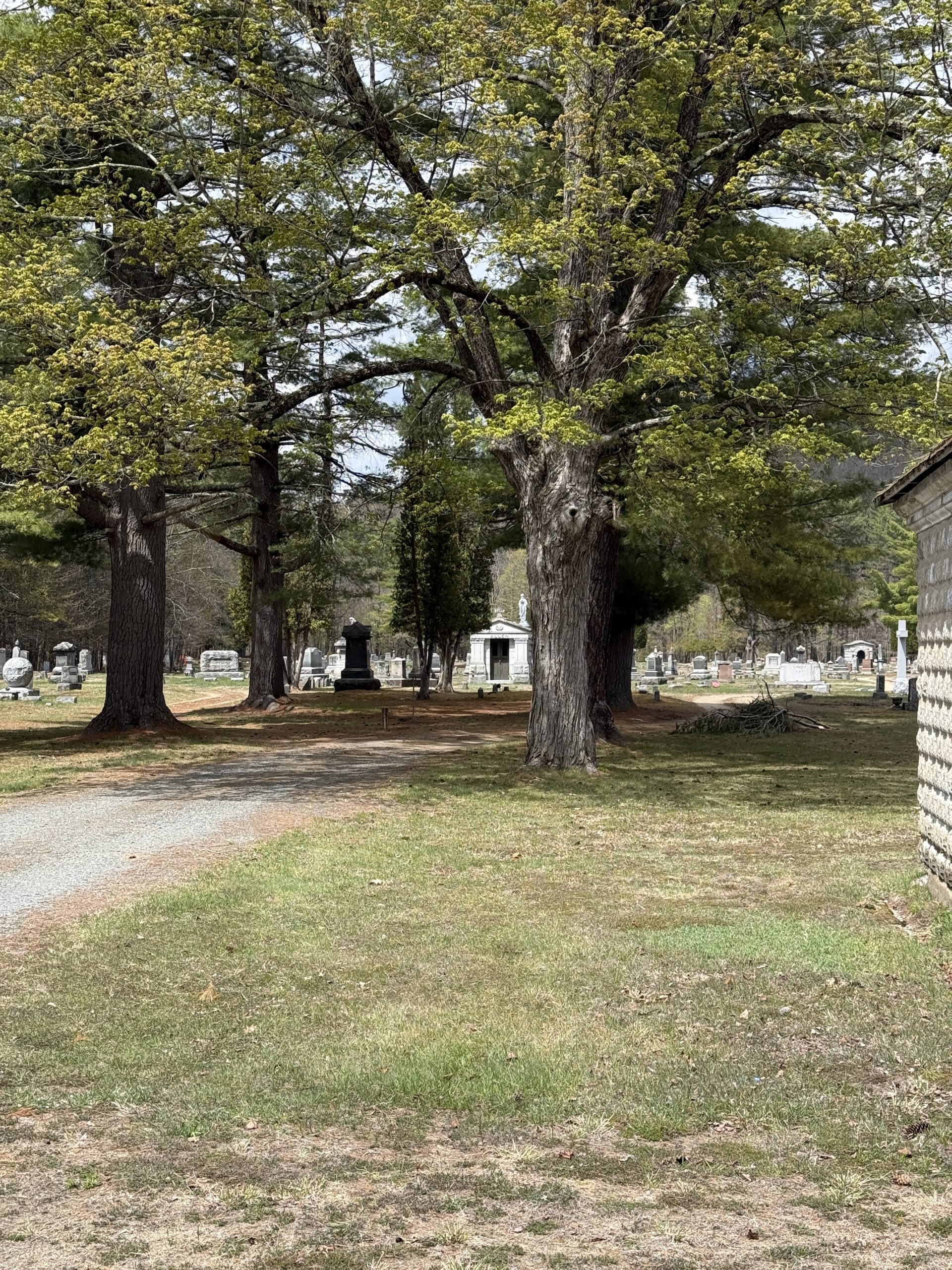 Roadway landscape with gravestones at Prospect Hill Cemetery in Northville New York